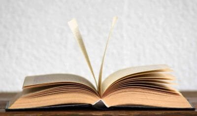 An open book with its pages standing up