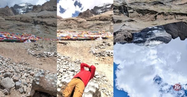 The author lying back on the saddle rock, viewing the West Face inverted.