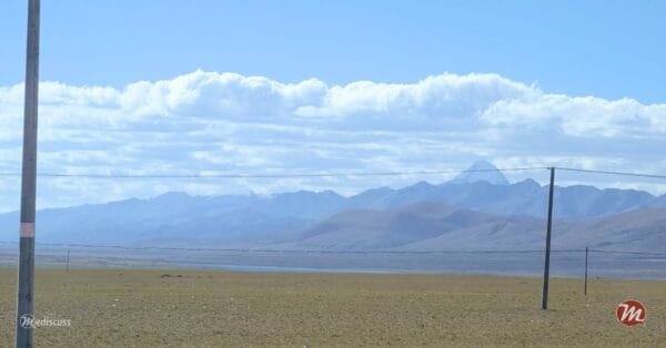 First distant view of Mount Kailash from the approach near Manasarovar.